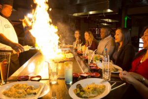 A group enjoys dinner at Shogun, a great place to try the practice of hara hachi bu.