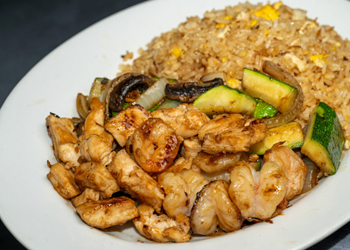 RIU Samurai Special - We love making guests happy with specials like the Samurai that features the crowd-pleasing combo of chicken and shrimp teppanyaki. Img